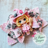 Pink spider witch 4" bow with spiders and clay doll embellishments